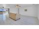 Spacious living room with a ceiling fan and large windows with an amazing view at 2831 Goldrush St, Pahrump, NV 89048