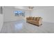 Spacious living room with a ceiling fan and large windows with an amazing view at 2831 Goldrush St, Pahrump, NV 89048