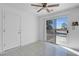 Bright living space with tile flooring and a sliding glass door at 2831 Goldrush St, Pahrump, NV 89048