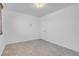 Neutral room featuring tile flooring and white walls at 2831 Goldrush St, Pahrump, NV 89048
