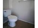 Clean bathroom featuring a toilet and neutral colored tile floor at 3417 Civic Center Dr # B, North Las Vegas, NV 89030