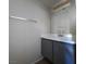 Bathroom featuring updated vanity with neutral countertop, sink, and mirror at 3417 Civic Center Dr # B, North Las Vegas, NV 89030