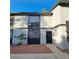 Charming condo featuring stucco siding, dual pane windows, and a well-maintained front yard at 3420 Mercury St # H, North Las Vegas, NV 89030