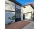 Inviting condo showcasing stucco siding, dual pane windows, and a manicured front yard at 3420 Mercury St # H, North Las Vegas, NV 89030