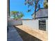 Backyard has desert landscaping and a perimeter of grey concrete block walls at 3523 Mercury St # A, North Las Vegas, NV 89030