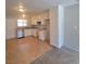 Well-maintained kitchen featuring ample cabinet space, stainless steel appliances and tile floor at 3523 Mercury St # G, North Las Vegas, NV 89030