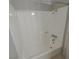 Bright white shower and tub combination features clean tile and chrome shower head at 3523 Mercury St # G, North Las Vegas, NV 89030