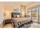 Cozy bedroom with a queen-size bed, stylish decor, and plenty of natural light, creating a peaceful retreat at 353 E Bonneville Ave # 439, Las Vegas, NV 89101