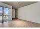 Modern bedroom featuring an attached balcony with a city view at 353 E Bonneville Ave # 904, Las Vegas, NV 89101