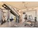 Functional gym space with various exercise equipment and a staircase at 353 E Bonneville Ave # 904, Las Vegas, NV 89101