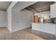 Contemporary kitchen with white cabinetry, stainless steel appliances, and a breakfast bar at 353 E Bonneville Ave # 904, Las Vegas, NV 89101