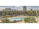 Inviting swimming pool area with lounge chairs and cabanas, perfect for relaxation and enjoying the Las Vegas views at 353 E Bonneville Ave # 904, Las Vegas, NV 89101