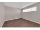 Clean bedroom with neutral paint, laminate floors, and a window at 364 Upland Blvd, Las Vegas, NV 89107