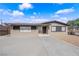 Well-maintained single-story home featuring a concrete driveway and xeriscaped landscaping at 364 Upland Blvd, Las Vegas, NV 89107