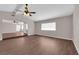 Open concept living space with wood-look floors, neutral paint and updated lighting at 364 Upland Blvd, Las Vegas, NV 89107
