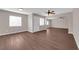 Bright living room featuring laminate floors, ceiling fans, and neutral paint at 364 Upland Blvd, Las Vegas, NV 89107