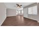 Living room features wood-look flooring, neutral color scheme, and natural light at 364 Upland Blvd, Las Vegas, NV 89107