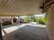 Spacious covered patio with an outdoor grill and serene landscaping at 388 Coronado Dr, Henderson, NV 89015