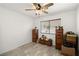 Bright bedroom featuring wood-look floors, natural light, and ample storage space at 388 Coronado Dr, Henderson, NV 89015