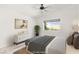 Virtually staged bedroom with modern decor, stylish dresser, and neutral color scheme at 388 Coronado Dr, Henderson, NV 89015