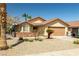 Charming single-story home featuring desert landscaping, a two-car garage, and a tile roof at 388 Coronado Dr, Henderson, NV 89015