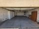 Practical garage with storage, shelving, and ample space for vehicles, ideal for organization and convenience at 388 Coronado Dr, Henderson, NV 89015