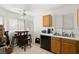 Kitchen area with a breakfast table and natural light from large windows at 388 Coronado Dr, Henderson, NV 89015