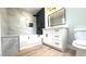 A modern bathroom showcases a tub and vanity at 4050 Pacific Harbors Dr # 209, Las Vegas, NV 89121