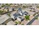 Extensive community of modern homes adorned with solar panels and well-maintained landscaping with paved driveways at 410 Gracious Way, Henderson, NV 89011