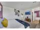 Bedroom showing a tv, art and ensuite bathroom at 410 Gracious Way, Henderson, NV 89011