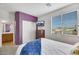 Bedroom with ensuite bathroom and sliding closet doors at 410 Gracious Way, Henderson, NV 89011