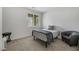 Cozy bedroom with a twin bed, neutral decor, carpet flooring and a window with blinds at 410 Gracious Way, Henderson, NV 89011