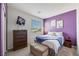 Bedroom with window, tv, and dresser at 410 Gracious Way, Henderson, NV 89011