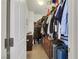 Walk-in closet offering ample storage with shelving, drawers, and room for luggage at 410 Gracious Way, Henderson, NV 89011