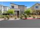 Contemporary two-story home with desert landscaping and dark trim, located in a vibrant community at 410 Gracious Way, Henderson, NV 89011