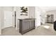 Stylish bar area, complete with bar cabinet and decor, located off the living area at 4148 Campriani Ave, North Las Vegas, NV 89084