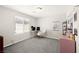 Bright bedroom with a desk, a rocking chair, and a pink dresser at 4148 Campriani Ave, North Las Vegas, NV 89084