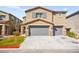 Charming two-story home featuring a two-car garage and a well-maintained front yard at 4148 Campriani Ave, North Las Vegas, NV 89084