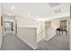 Upstairs hallway boasts neutral tones, carpet, and natural light at 4148 Campriani Ave, North Las Vegas, NV 89084