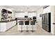 Modern kitchen featuring stainless steel appliances, granite countertops, and a kitchen island with barstool seating at 4148 Campriani Ave, North Las Vegas, NV 89084