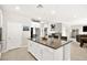 Modern kitchen island with granite countertops and stainless-steel appliances, part of an open concept design at 4148 Campriani Ave, North Las Vegas, NV 89084