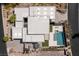 An aerial view depicts the layout of a modern house, RV garage, pool, and outdoor kitchen at 505 Dragon Gate Ct, Henderson, NV 89012
