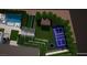 Aerial view of backyard showcasing pool, sport court, and outdoor dining area, all surrounded by lush landscaping at 505 Dragon Gate Ct, Henderson, NV 89012