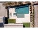 Top-down aerial view of a modern backyard featuring a pool and spa, outdoor living spaces, and landscaping at 505 Dragon Gate Ct, Henderson, NV 89012