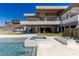 Beautiful backyard featuring a pool with spa and water feature and ample deck for entertaining at 505 Dragon Gate Ct, Henderson, NV 89012