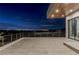 Spacious balcony features sleek railings and modern design with a striking nighttime city view at 505 Dragon Gate Ct, Henderson, NV 89012