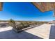 Expansive tiled balcony with steel railing overlooks the city, perfect for outdoor entertaining and enjoying city views at 505 Dragon Gate Ct, Henderson, NV 89012