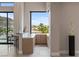 Chic bar area with seamless indoor/outdoor flow to enjoy the outdoor views and scenery at 505 Dragon Gate Ct, Henderson, NV 89012
