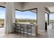 This well-appointed bar area features comfortable seating and stunning outdoor views at 505 Dragon Gate Ct, Henderson, NV 89012