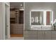 The bathroom includes dual sinks, vanity, custom cabinets, and closet access at 505 Dragon Gate Ct, Henderson, NV 89012
